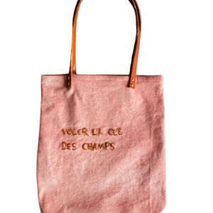 sac cabas brodé, en velours côtelé rose pâle, avec anses en cuir fauve, sur fond blanc